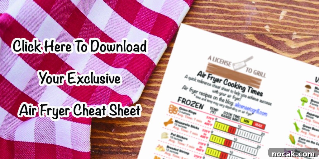 Crispy Air Fryer Corn Dogs Recipe (Homemade) 7 air fryer cheat sheet preview sitting on wood desk with text "click here to download your exclusive air fryer cheat sheet"