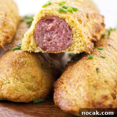 An air fryer corn dog sliced in half.