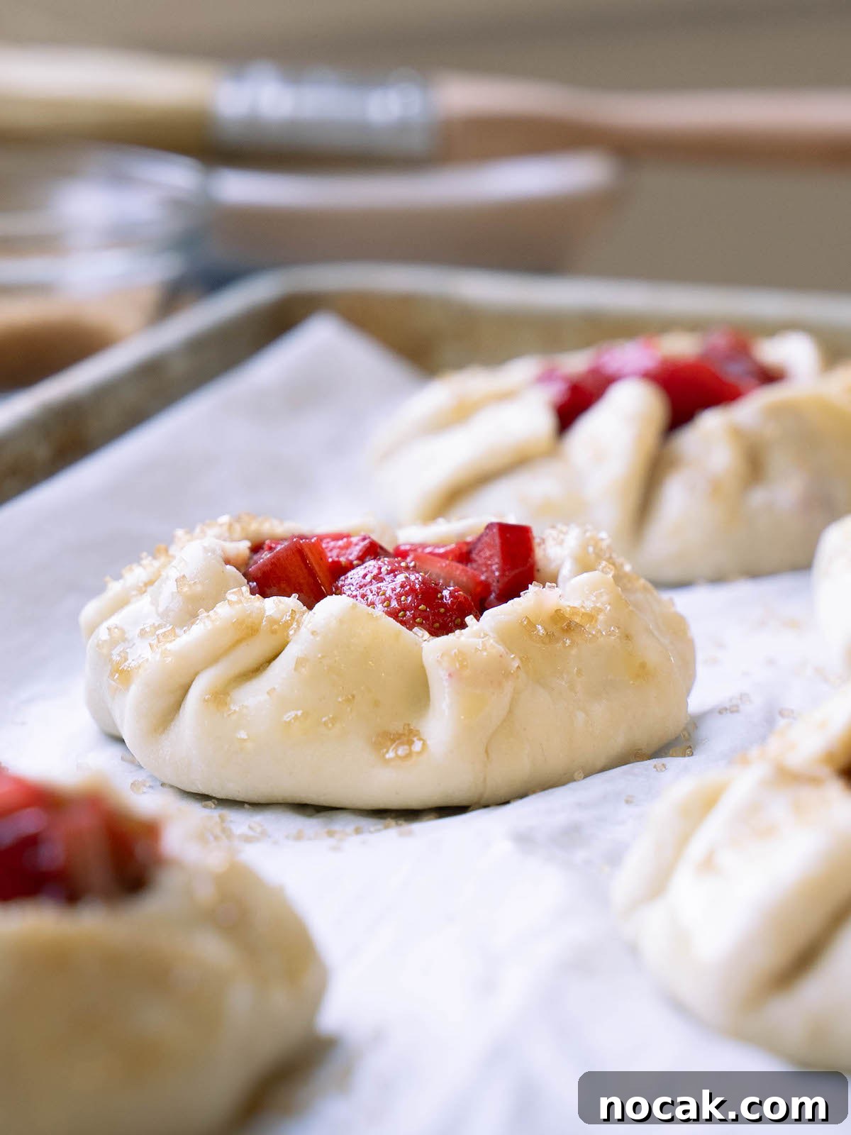 Rustic Strawberry Rhubarb Galettes with Flaky Crust 4 Strawberry rhubarb tarts before baking