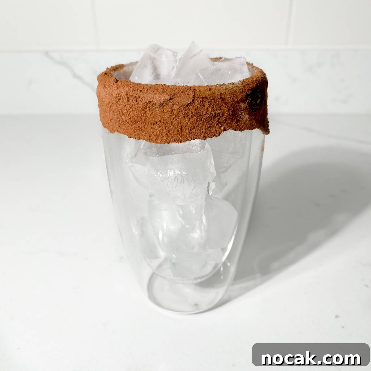 Iced Milo Dinosaur with Condensed Milk: Creamy Milo Drink Recipe 11 Filling the glass with ice.