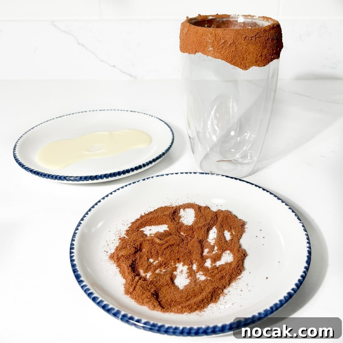 Iced Milo Dinosaur with Condensed Milk: Creamy Milo Drink Recipe 4 A decorated glass with a milo rim.