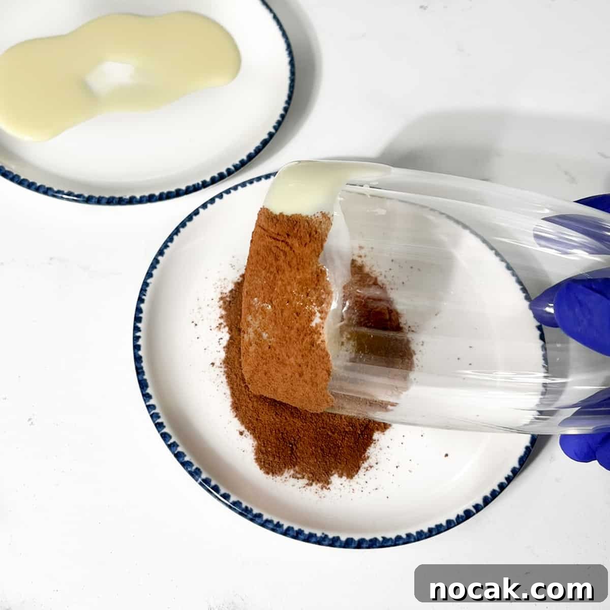 Iced Milo Dinosaur with Condensed Milk: Creamy Milo Drink Recipe 6 Rolling the edge of the glass in milo powder.