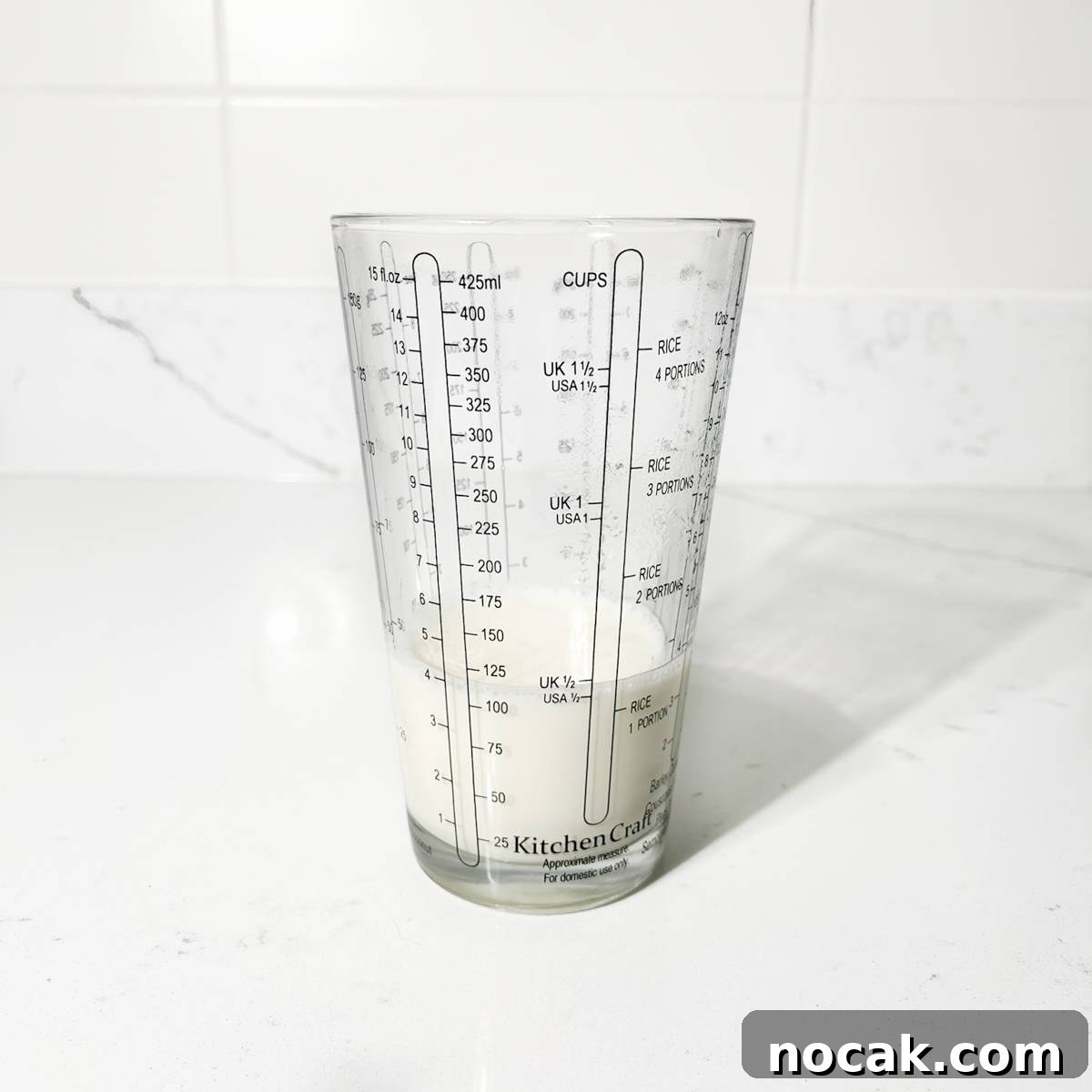 Iced Milo Dinosaur with Condensed Milk: Creamy Milo Drink Recipe 7 Boiling the milk for the mill dinosaur.