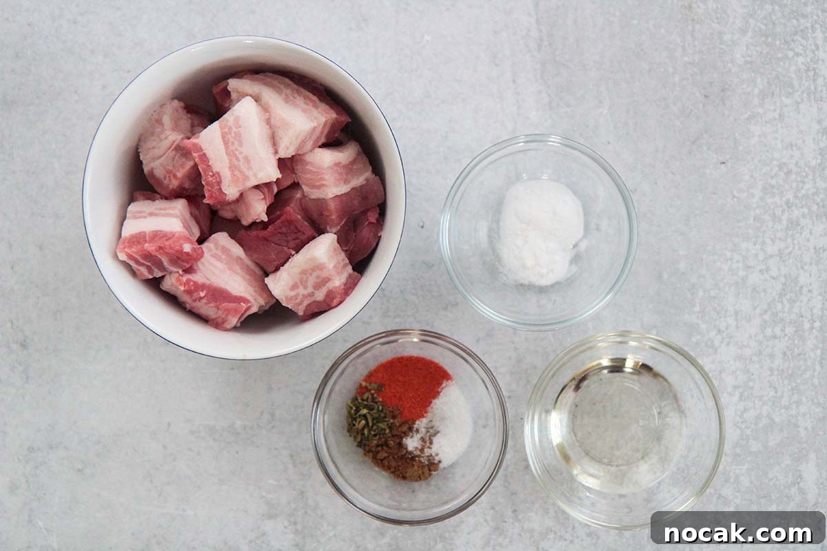 Crispy Air Fryer Pork Belly Recipe: Perfect Crackling in Minutes 3 ingredients for air fryer pork belly in small bowls.