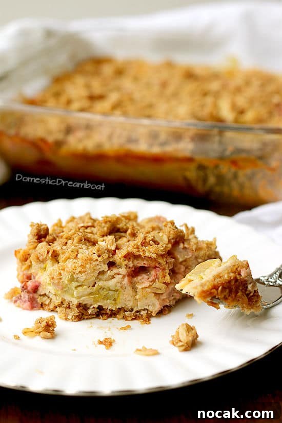 Gluten-Free Corn Tres Leches Cake Recipe for Moist, Flavorful Dessert 6 Slice of rhubarb crisp on a white plate