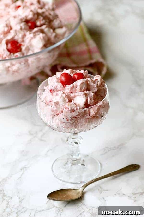 Gluten-Free Corn Tres Leches Cake Recipe for Moist, Flavorful Dessert 8 Tropical Cherry Ambrosia in a crystal glass