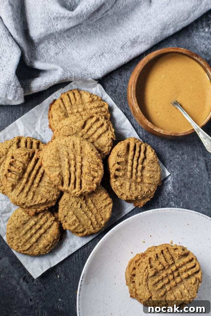 Chewy Peanut Butter Cookies Recipe with Crispy Edges 3 peanut butter cookies