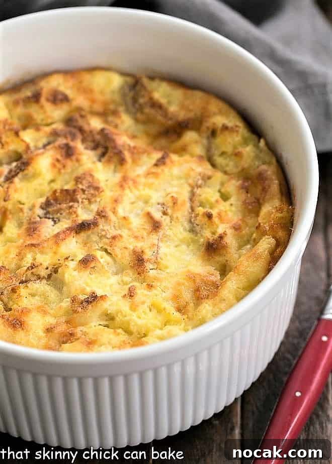 Cheese Omelet - A delicious Cheese and Bread Souffle made in the oven! Super easy and perfect for Lent or a meatless meal. Cheese Souffle AKA Omelet in a casserole dish.