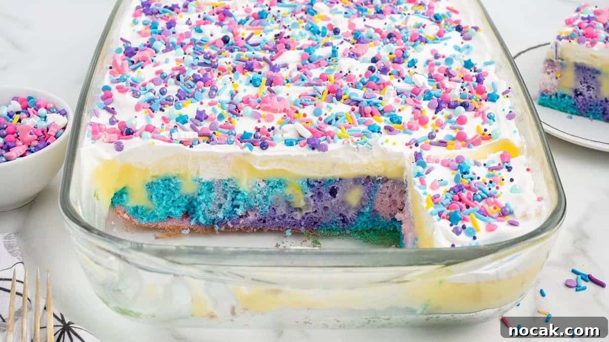 Unicorn Poke cake on a baking dish. 