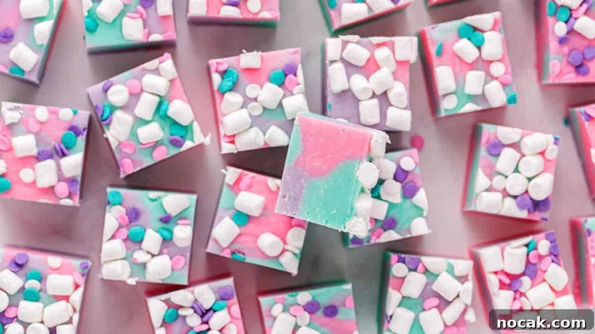 A couple of pieces of slices of Unicorn themed Fudge. 