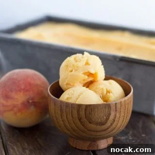 Peach sorbet in a bowl.