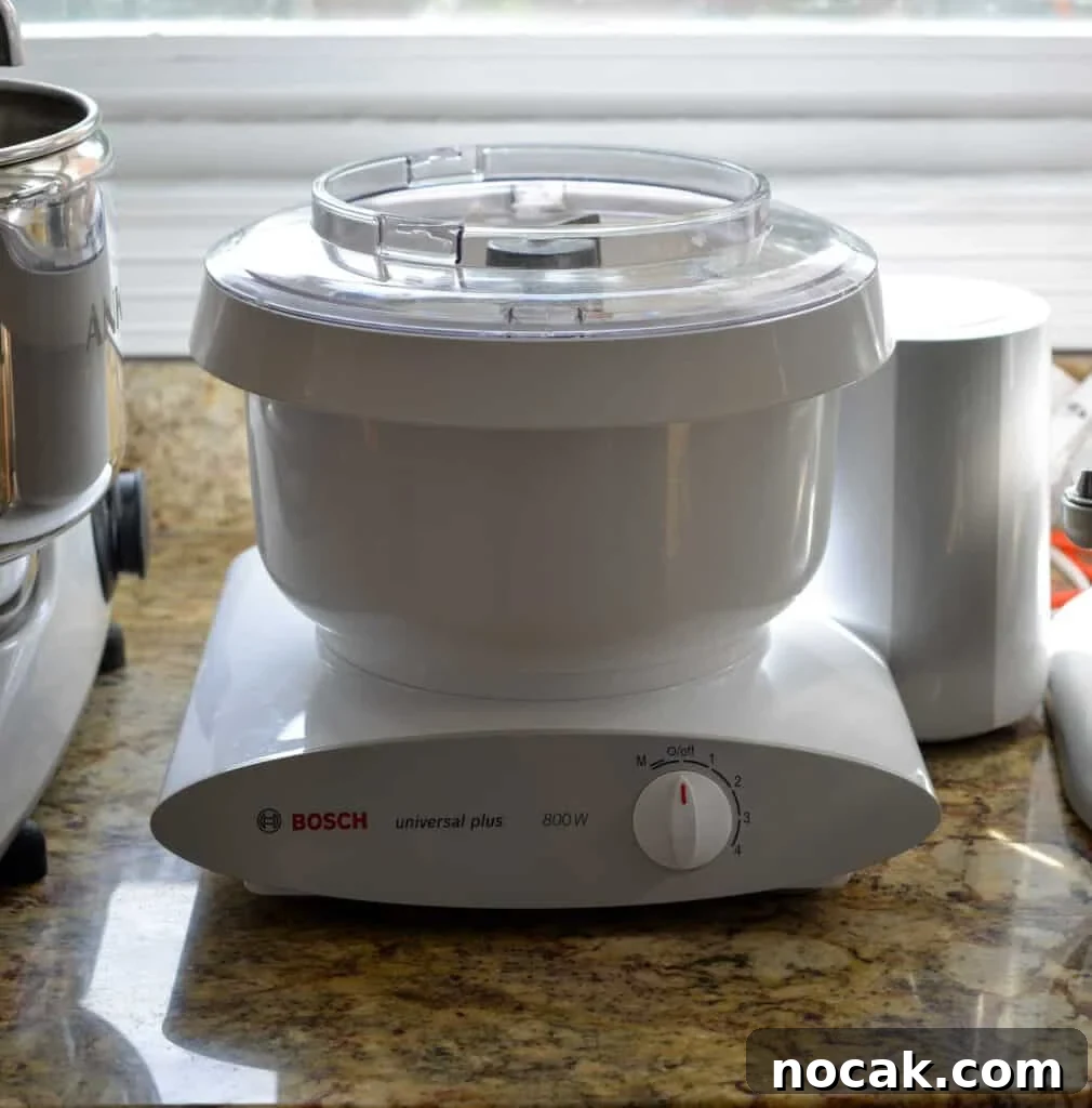 Stand Mixer Reviews: KitchenAid, Bosch, Ankarsrum & Ooni Compared 7 Bosch mixer on a countertop.