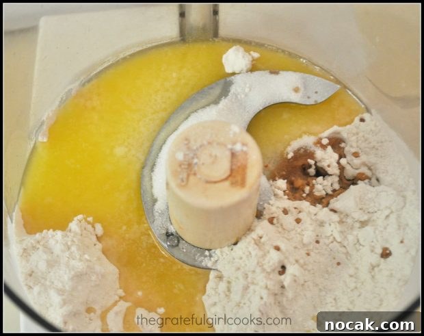 Mixing dough for lemon bar crust in food processor