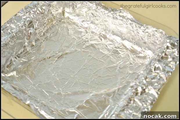 Line 8x8 pan with aluminum foil for lemon bar filling