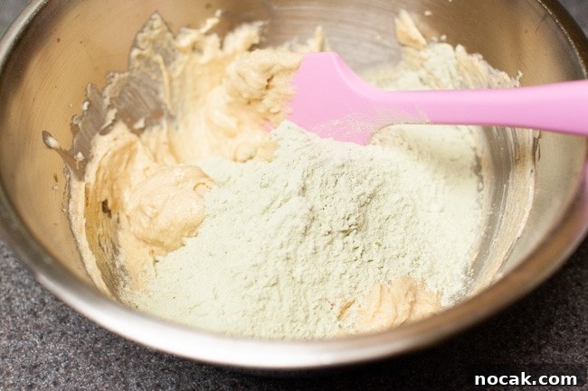 Combining mixtures Mixing dry ingredients into butter
