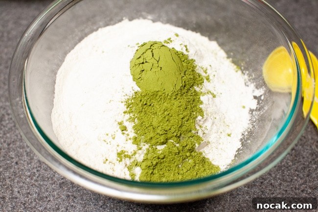 Adding matcha Matcha powder added to flour and salt