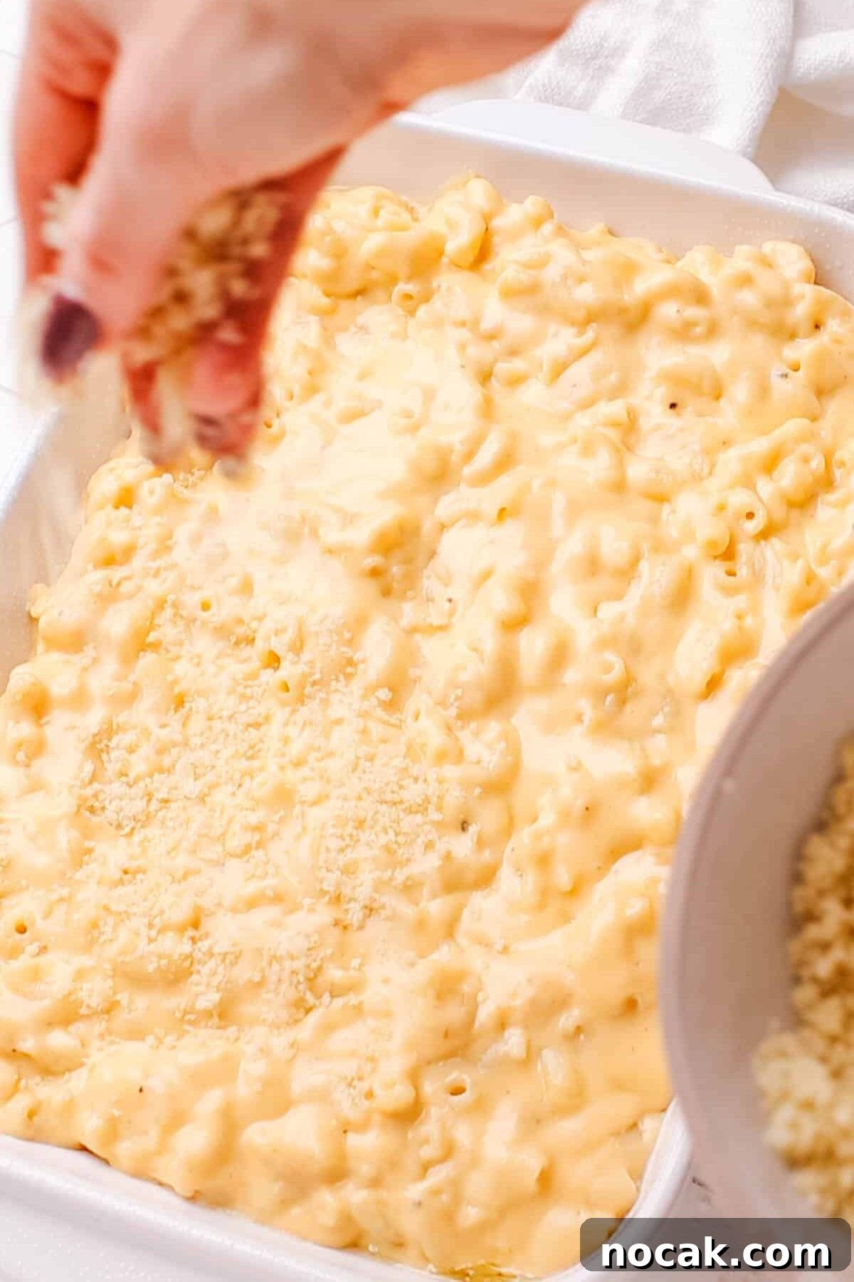 Creamy Cheese Sauce Recipe for Mac and Cheese 11 Adding bread crumbs on baked macaroni and cheese.