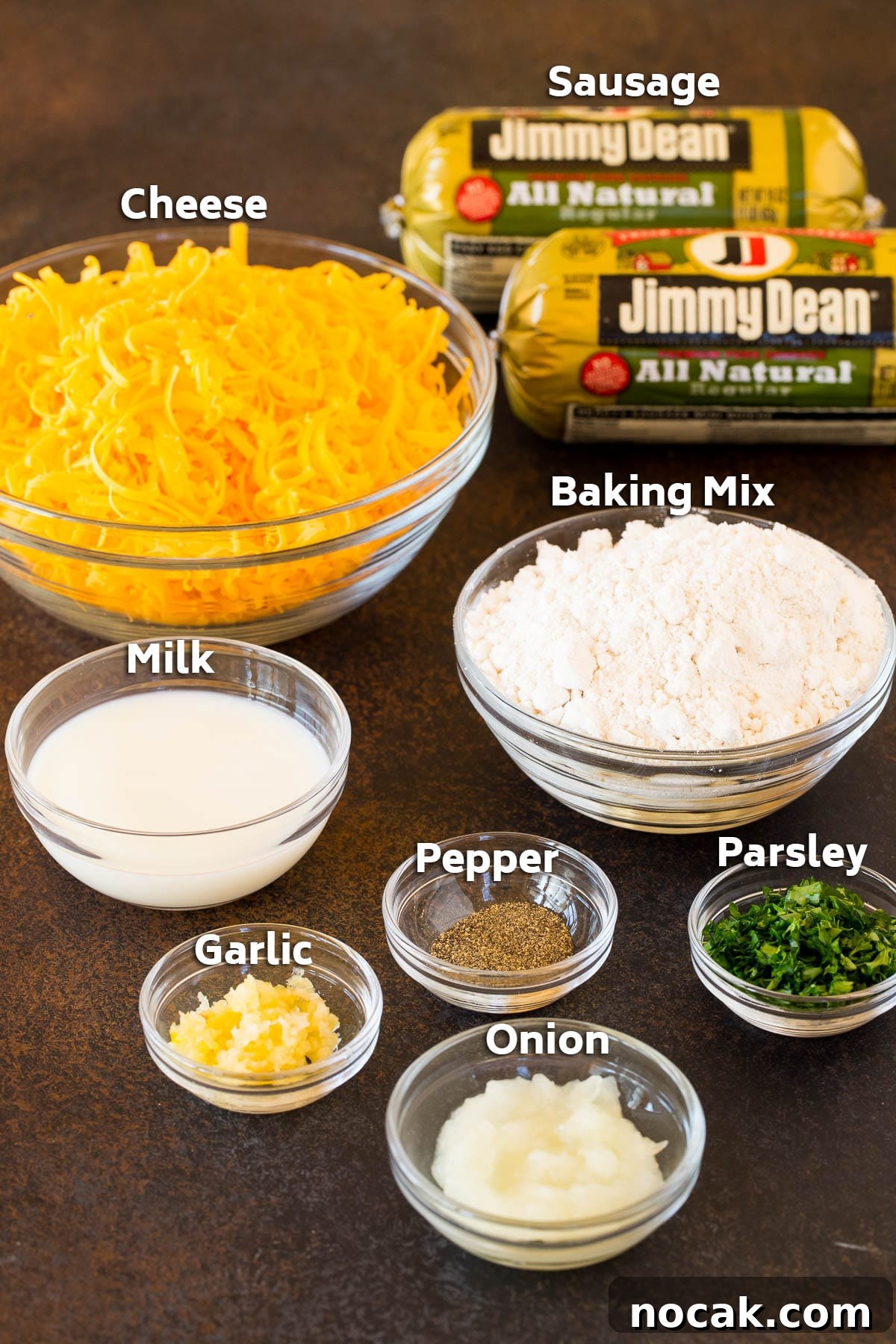 Classic Southern Sausage Balls Recipe with Cheesy Biscuits 3 Bowls of ingredients including sausage, cheese, bisquick and seasonings.