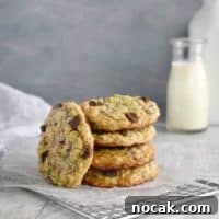Chewy Oatmeal Chocolate Chip Cookie Recipe for Perfect Texture 11 stack of 4 oatmeal cookies on cooling rack