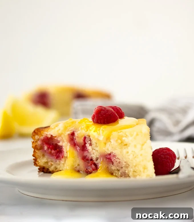 Lemon Curd-Glazed Ricotta Raspberry Cake Recipe 2 A picture of ricotta raspberry cake with lemon curd glaze