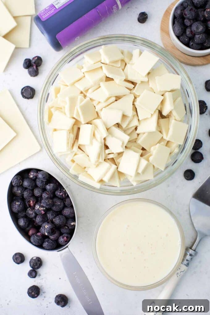 Creamy No-Bake Blueberry Fudge Recipe 4 blueberry fudge ingredients in bowls on a table