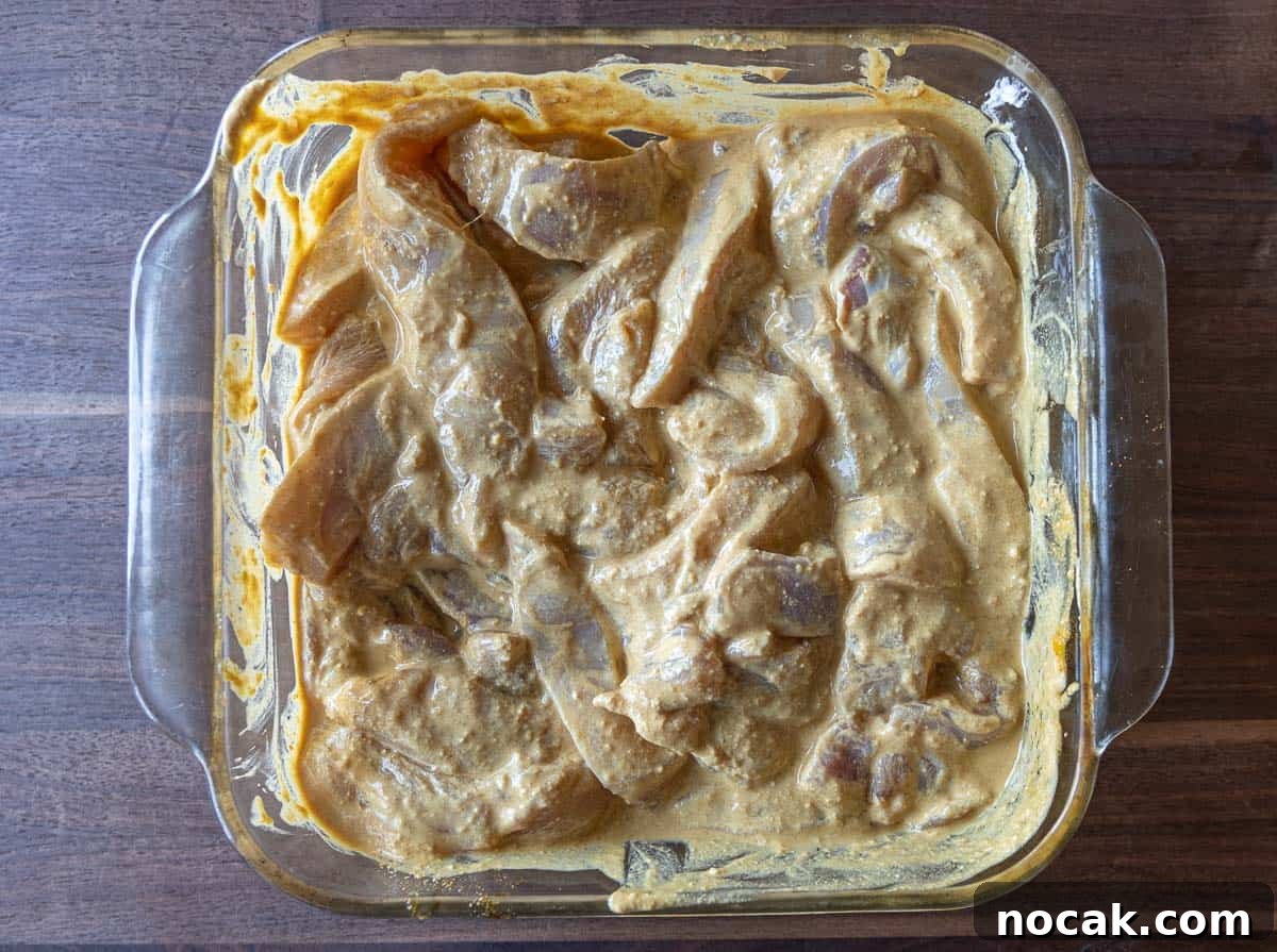 Chicken Satay Skewers with Creamy Peanut Dipping Sauce 4 Chicken strips in a satay marinade.