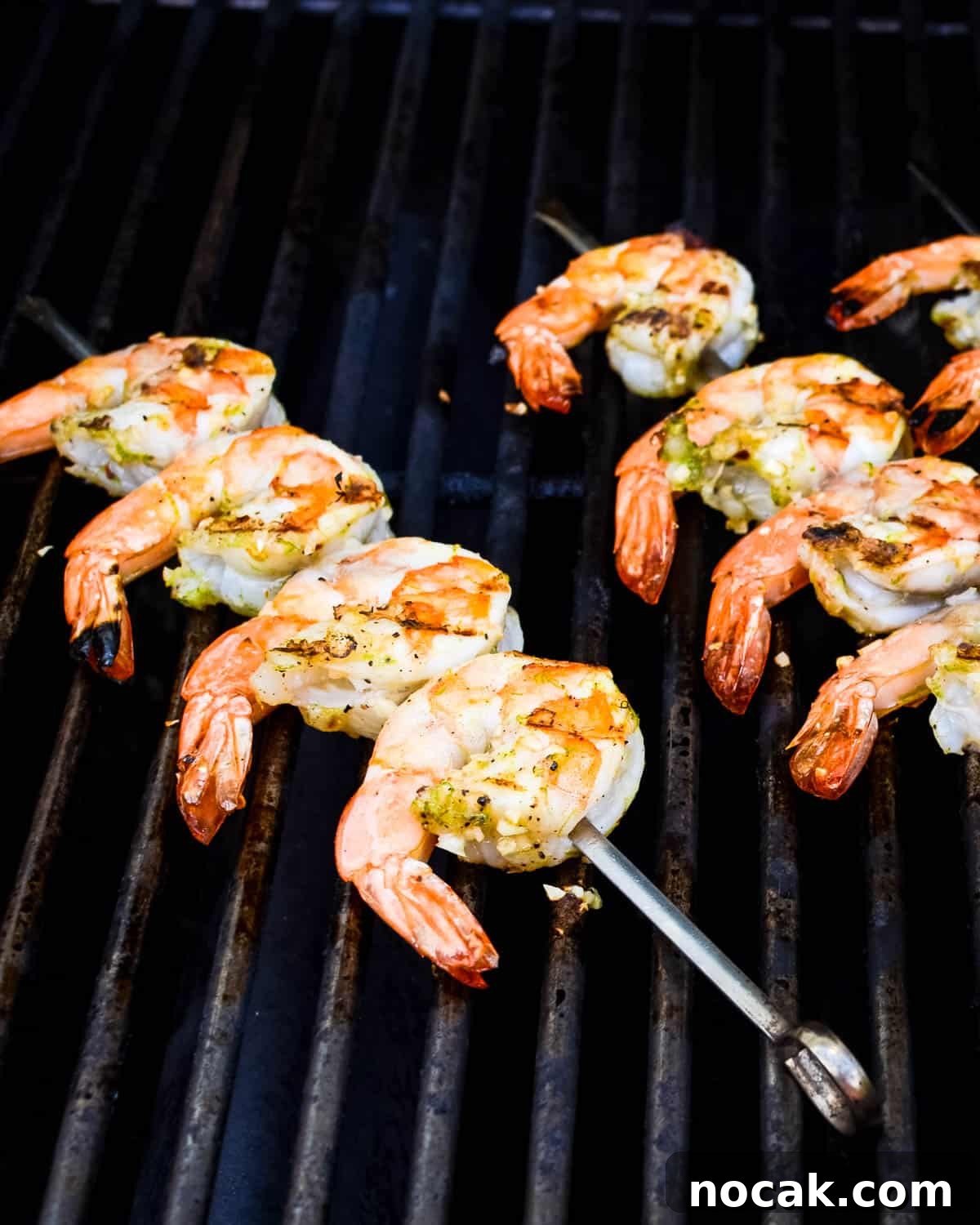 Citrus-Grilled Shrimp Cocktail with Zesty Dipping Sauce 7 Grilling the shrimp kabobs.