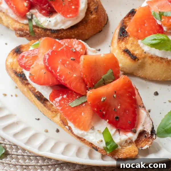 Strawberry basil bruschetta with whipped lemon ricotta on toasted baguette.