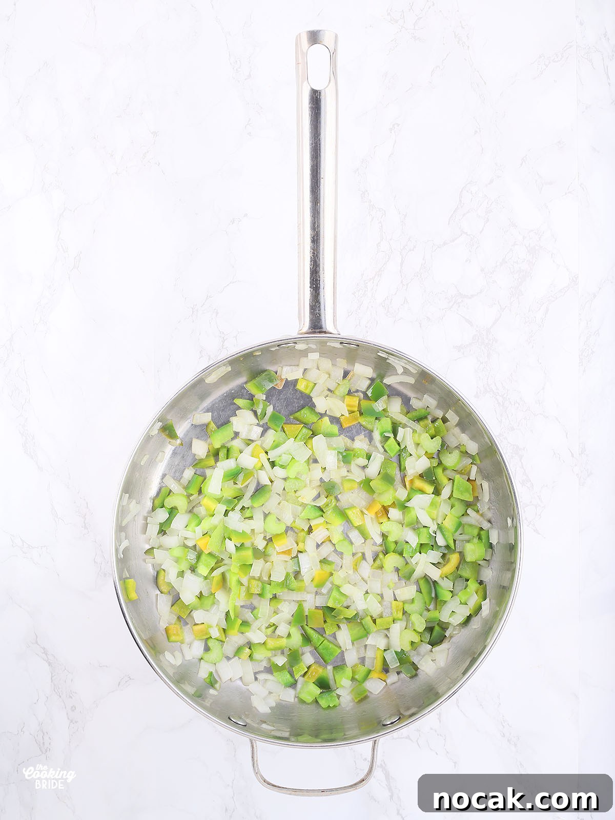 Authentic Louisiana Shrimp Creole Recipe — Classic Creole Flavor 3 diced green bell peppers, celery and onions sautéing in melted butter