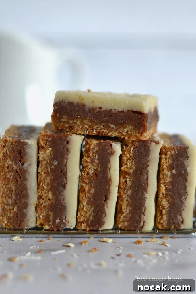 Oat bottom layered brownies on a cooling rack