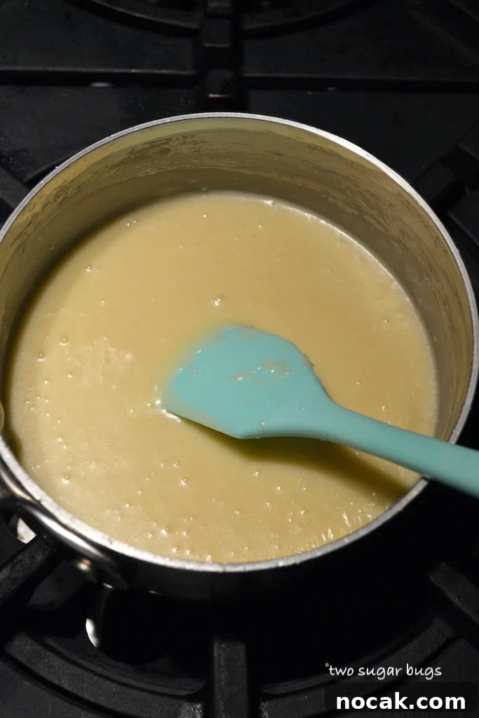 white chocolate topping in a saucepan