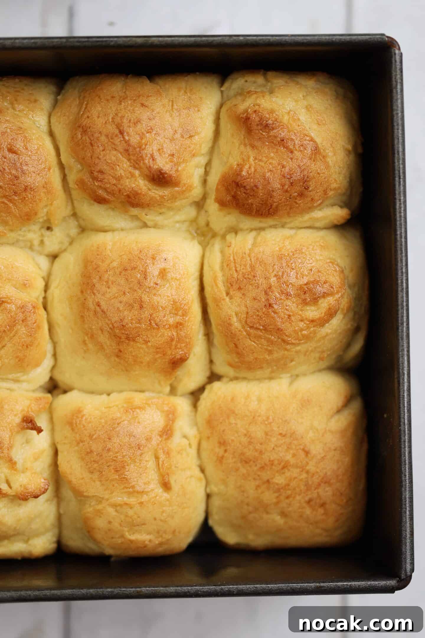 Gluten-Free Hawaiian Rolls Recipe: Soft, Sweet, and Vegan Option 4 Close up of gluten free Hawaiian rolls in a tin.
