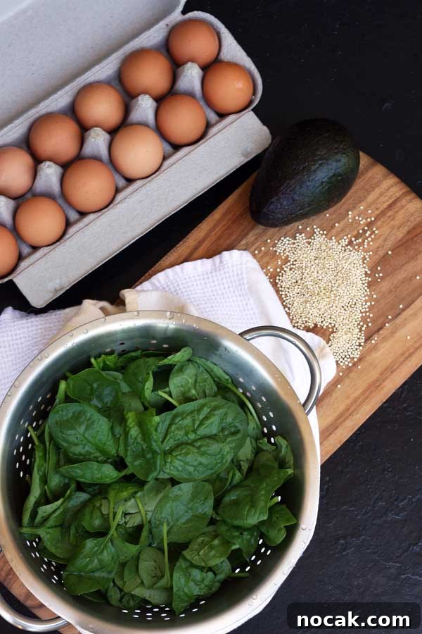 Poached Eggs with Avocado, Spinach and Crispy Quinoa 3 Ingredients for a breakfast of poached eggs with avocado, spinach & crispy quinoa