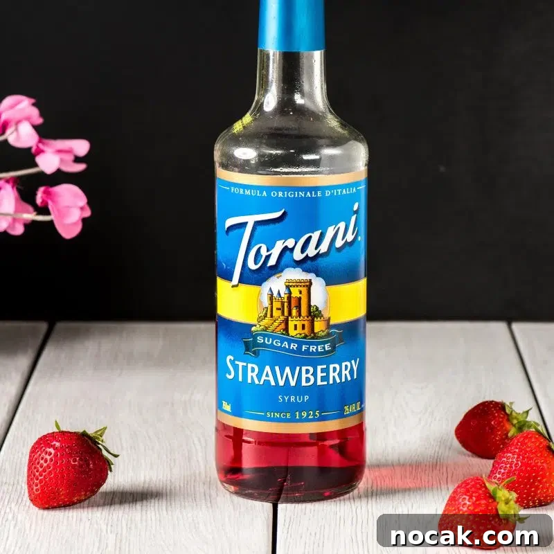Italian Strawberry Mimosa Cocktail Recipe 4 Bottles and glass