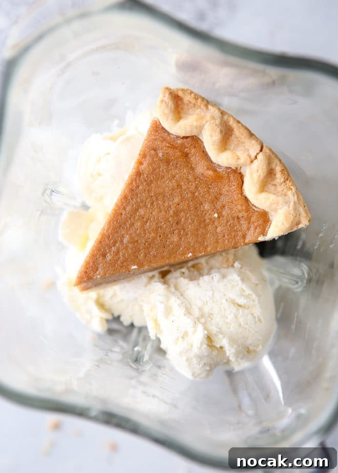 Creamy Pumpkin Pie Milkshake Recipe for Fall Dessert 4 This milkshake has a whole slice of pie in it