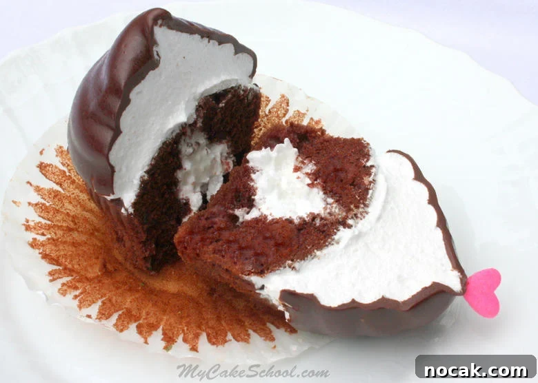 Delicious Hi Hat Cupcakes Tutorial Delicious Hi hat Cupcake featuring fluffy white frosting and a delicious chocolate shell!