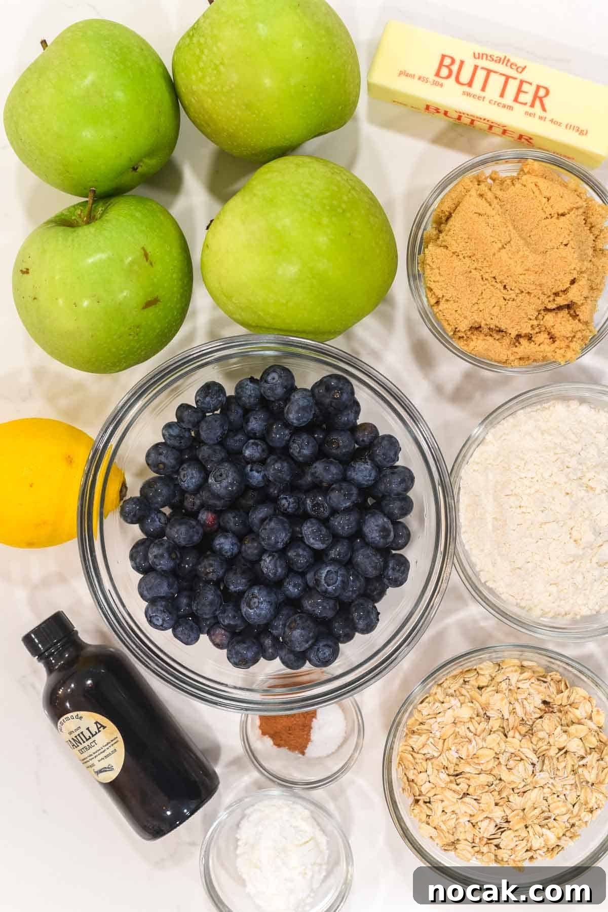 overhead shot of ingredients for apple blueberry crumble