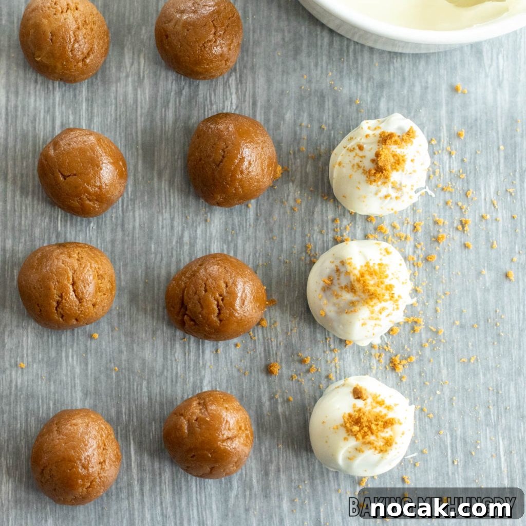 balls of dough being coating in white chocolate