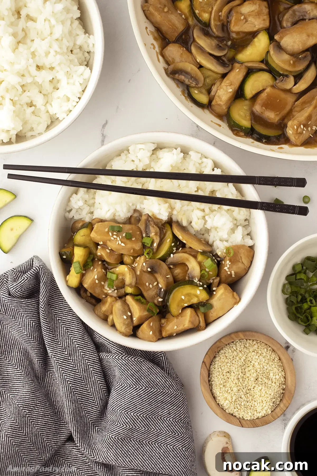 A rice bowl with some panda express chicken.
