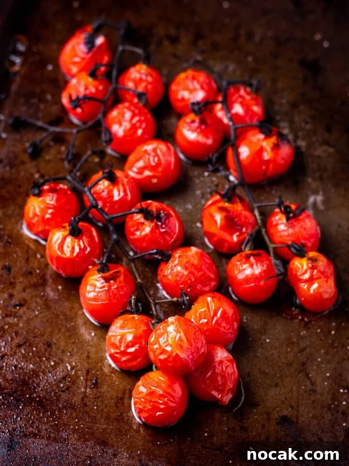 Pesto Rigatoni with Burst Cherry Tomatoes and Creamy Burrata 6 roasted tomatoes on sheet pan