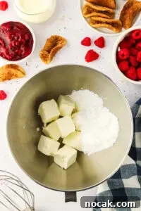 Raspberry Cheesecake Tacos: Creamy Dessert Taco Recipe 17 butter and confectioners sugar in a stand mixer bowl