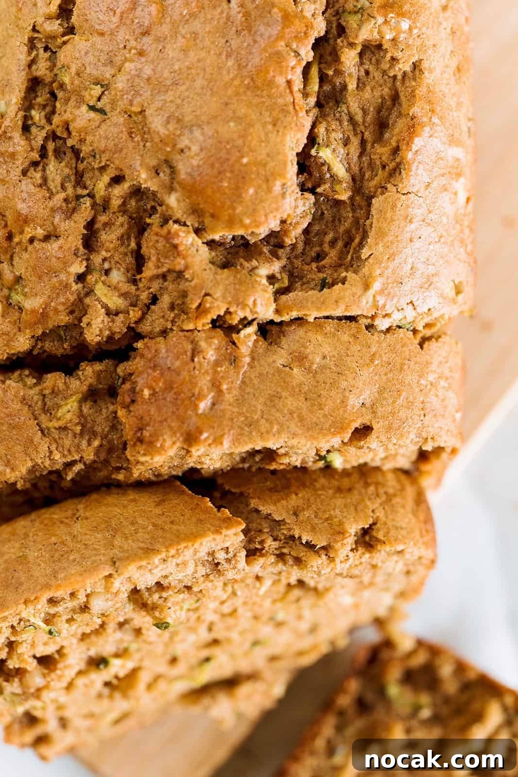 Moist Zucchini Bread with Greek Yogurt — No Squeezing Needed 3 sliced zucchini bread