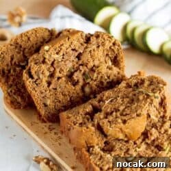 sliced zucchini bread on wooden board