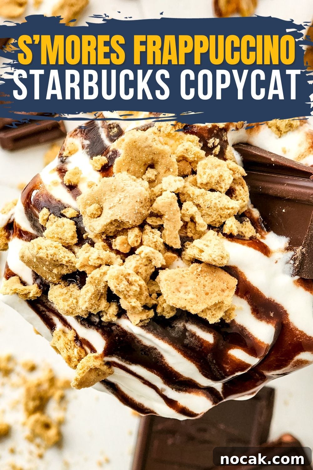 DIY S'mores Frappuccino: Starbucks Copycat Recipe for Home 2 Image of finished frappuccino drink served in glass, topped with whipped cream, chocolate drizzle, and graham cracker crumbles. Text over top in yellow and white font.