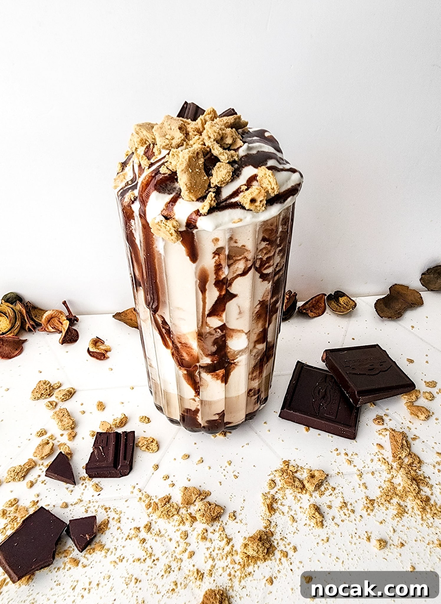 DIY S'mores Frappuccino: Starbucks Copycat Recipe for Home 8 Finished frappuccino recipe with chocolate drizzle, whipped cream, and chocolate drizzle.