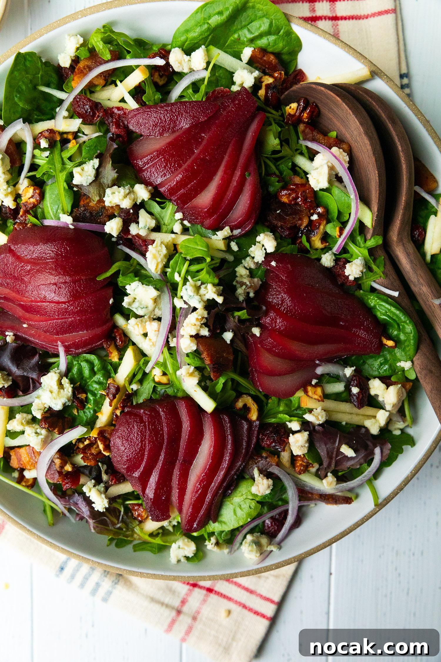 Red Wine-Poached Pear Salad with Blue Cheese, Pancetta & Walnuts 4 Poached pear halves