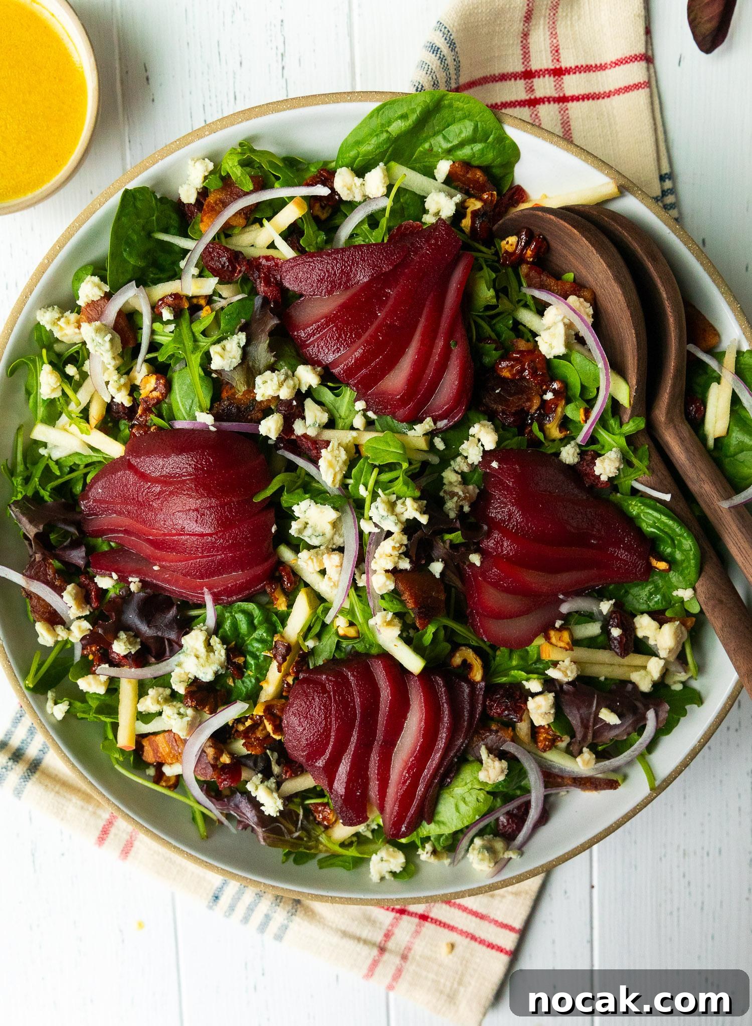 Red Wine-Poached Pear Salad with Blue Cheese, Pancetta & Walnuts 5 Salad plated for serving