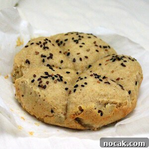 Gluten-Free Vegan Pull-Apart Dinner Rolls (Gum-Free) 2 vegan gluten free rolls on parchment paper