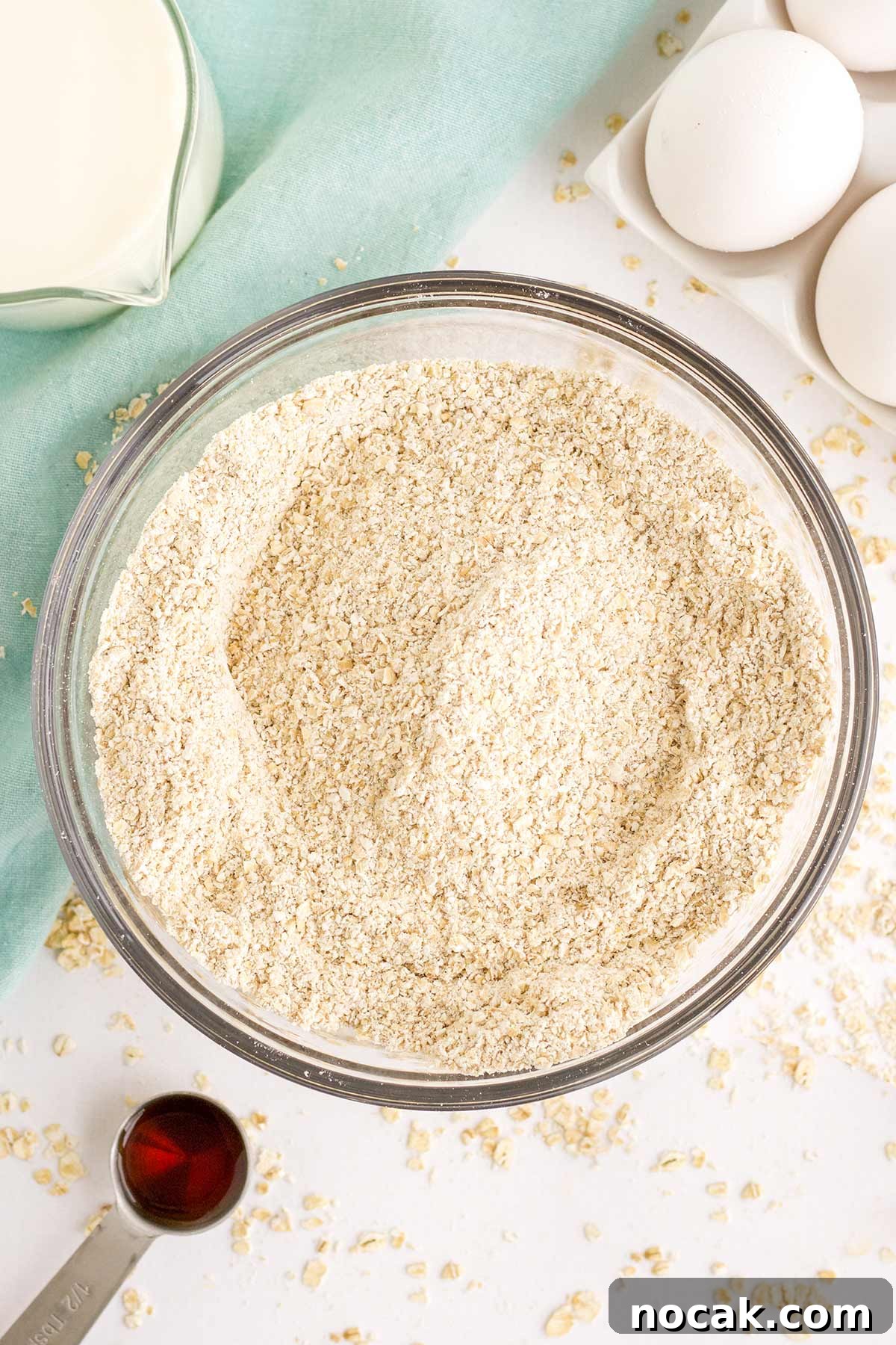 Fluffy Oat Flour Pancakes Recipe for Light, Tender Stacks 3 Ingredients to make pancakes with oat flour on the table.