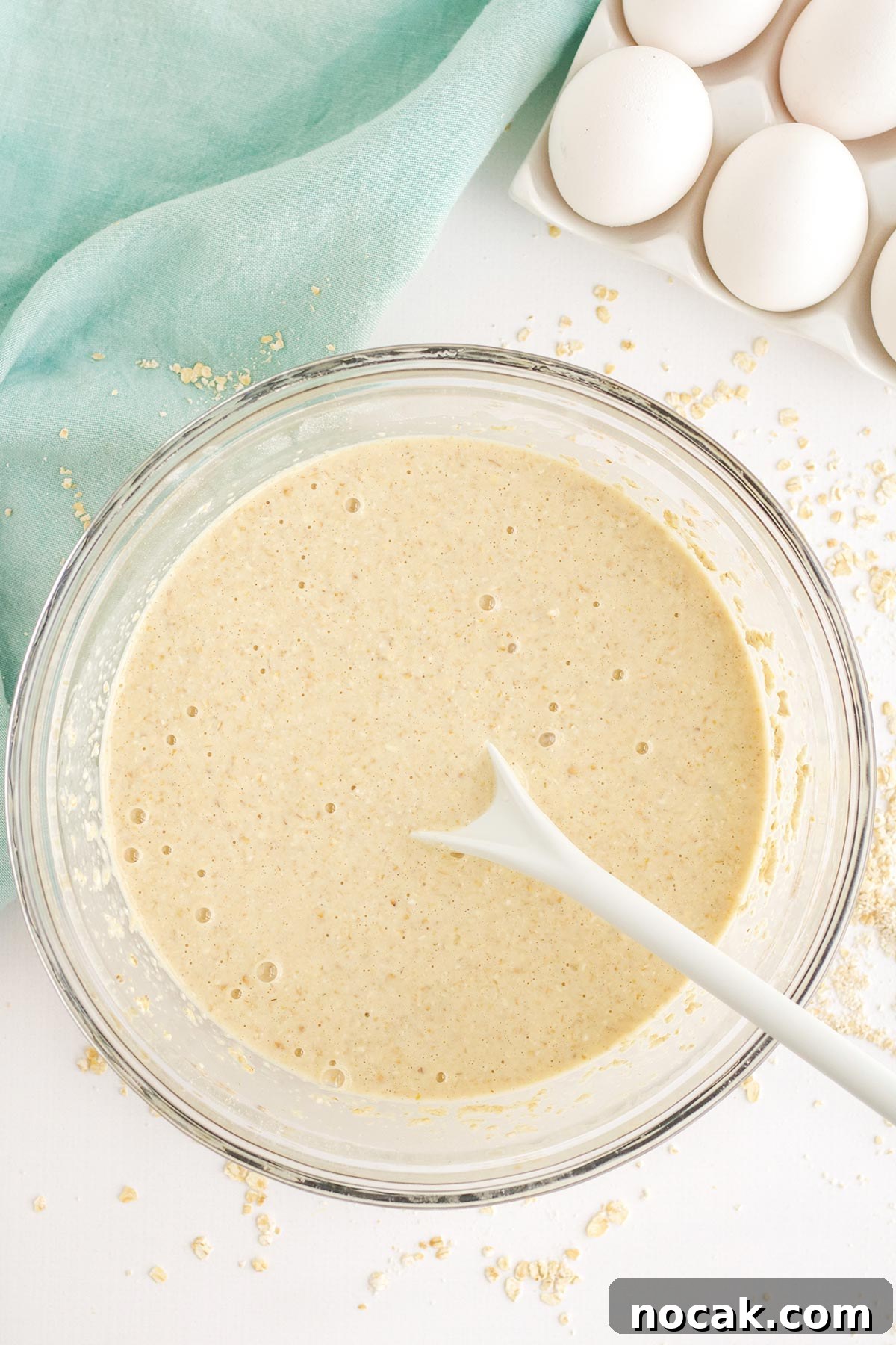 Fluffy Oat Flour Pancakes Recipe for Light, Tender Stacks 5 Batter for oat flour pancake recipe mixed in bowl.
